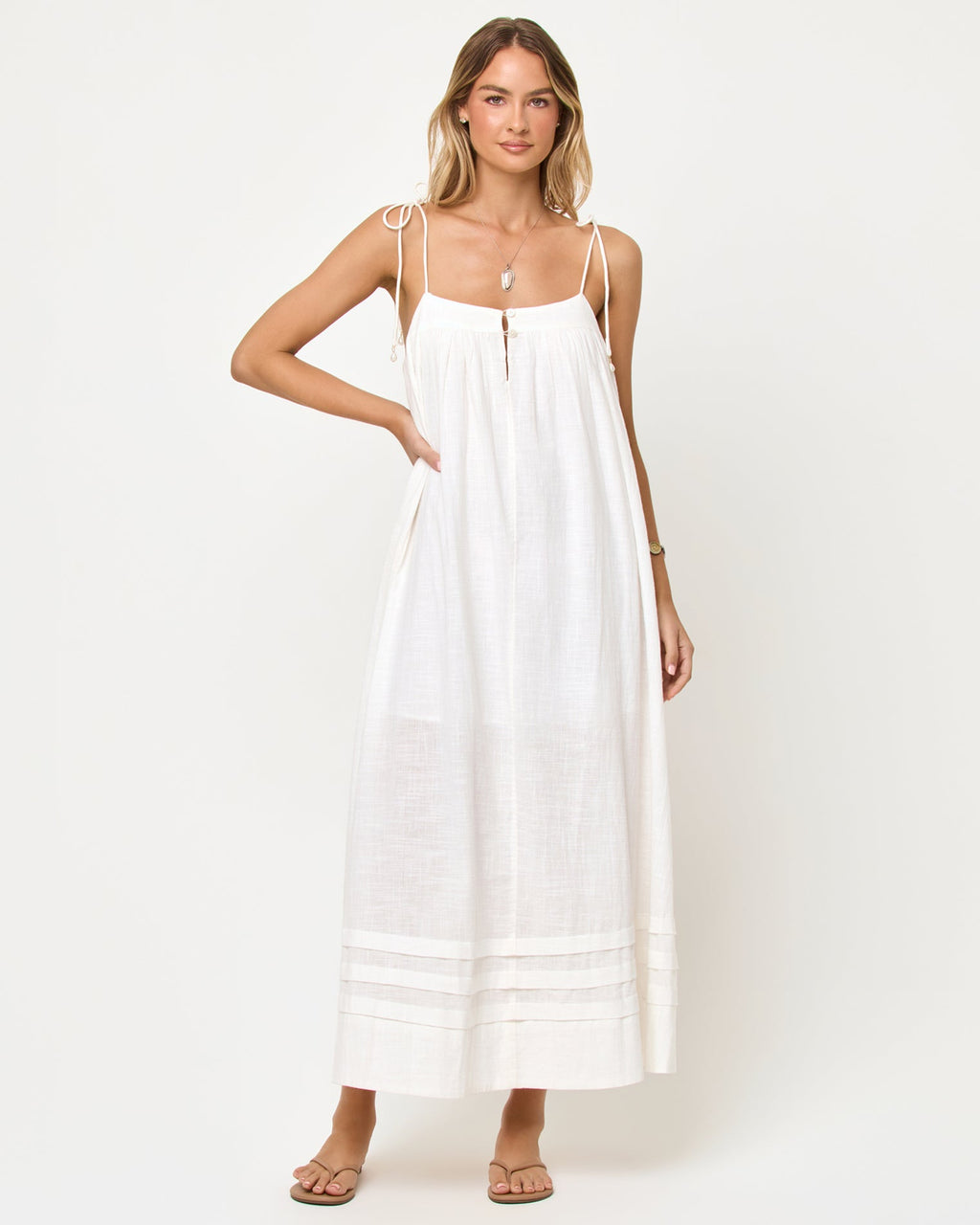 Robe longue en coton crème à bretelles, col carré et boutonnage avec ouverture goutte d'eau dans le dos