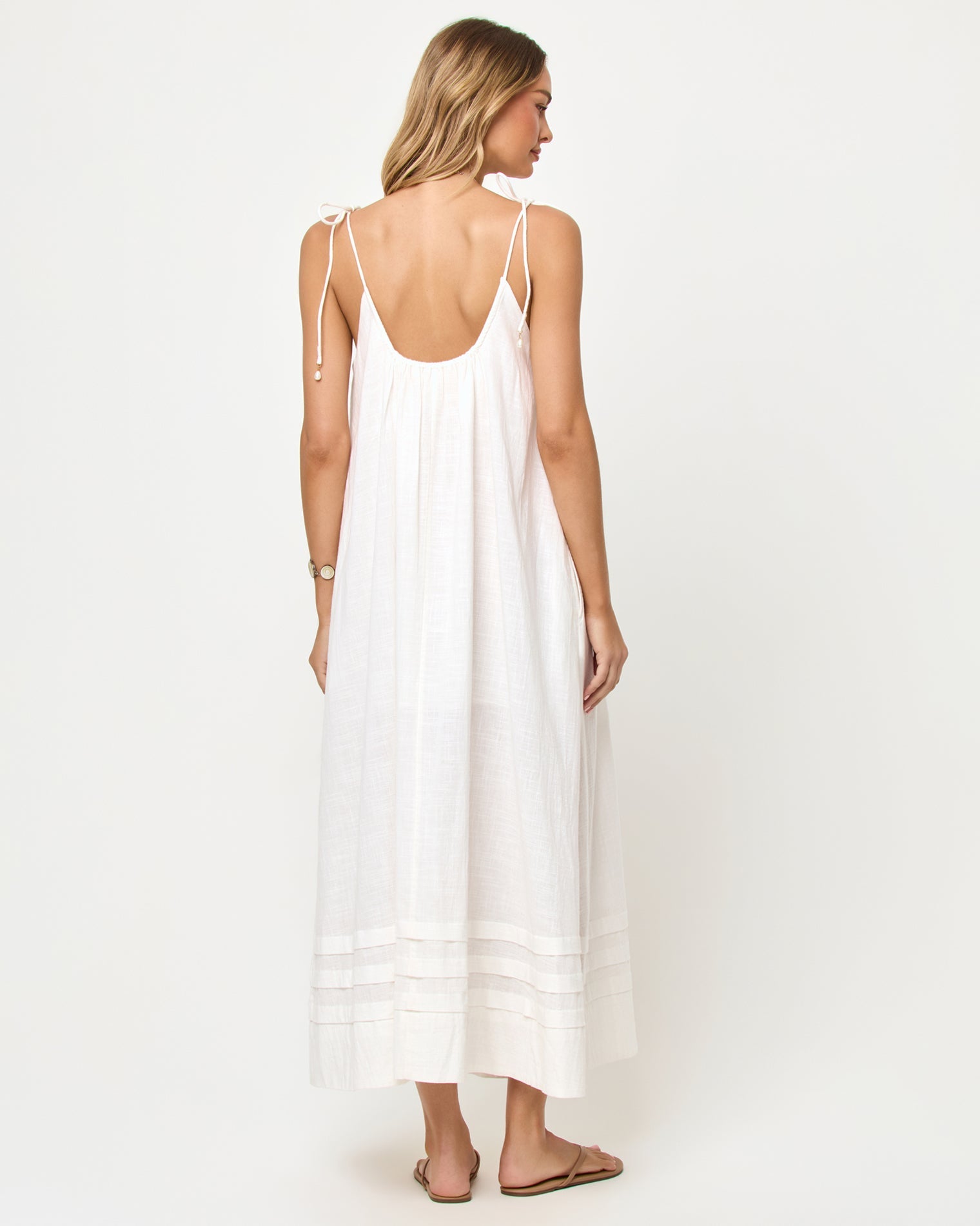 Robe longue en coton crème à bretelles, col carré et boutonnage avec ouverture goutte d'eau dans le dos