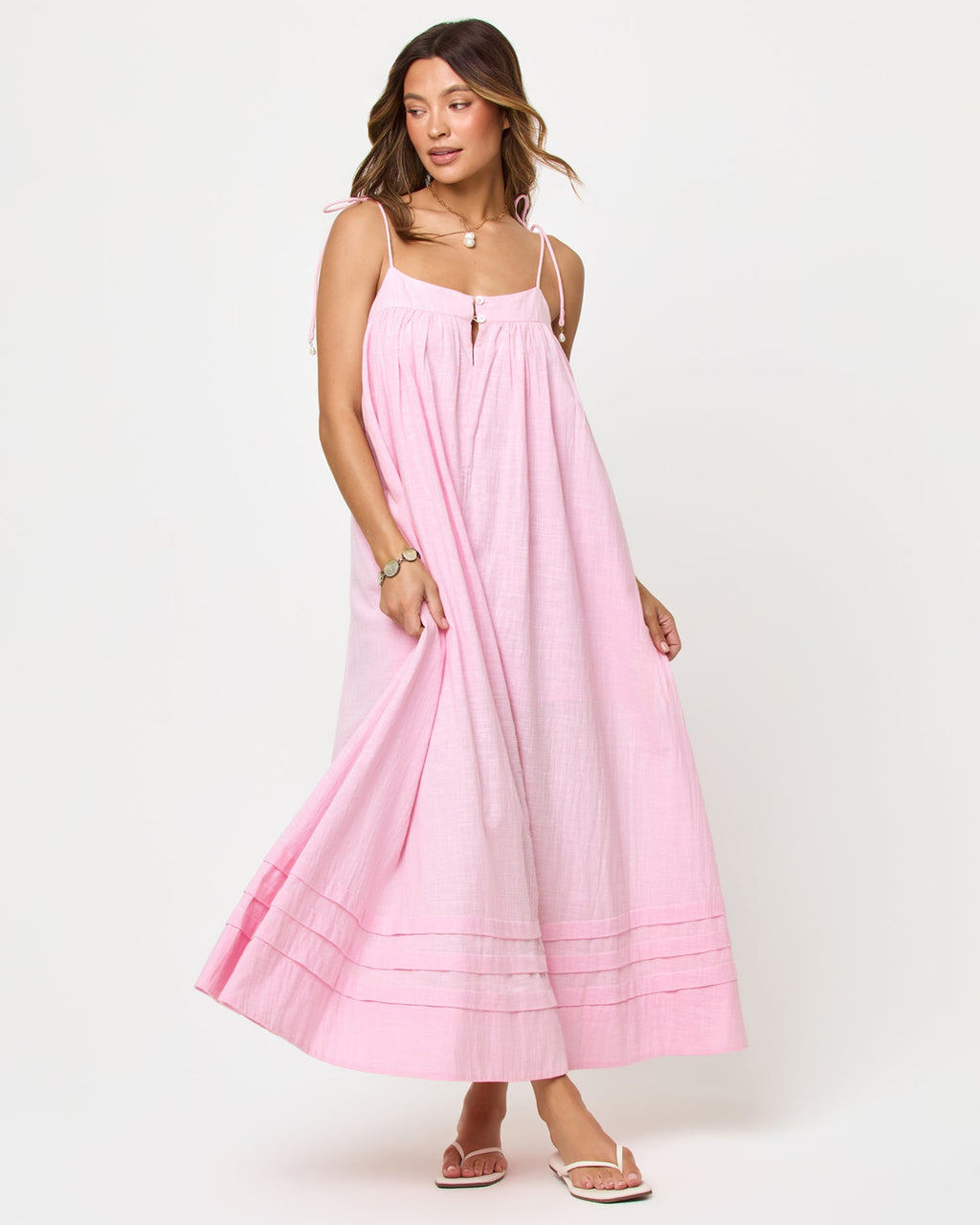 Robe longue en coton rose pâle avec bretelles à nouer et encolure carrée