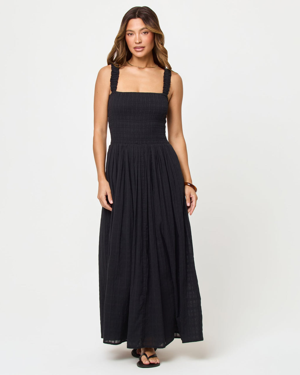 Robe longue noire en coton à smocks, larges bretelles et jupe ample