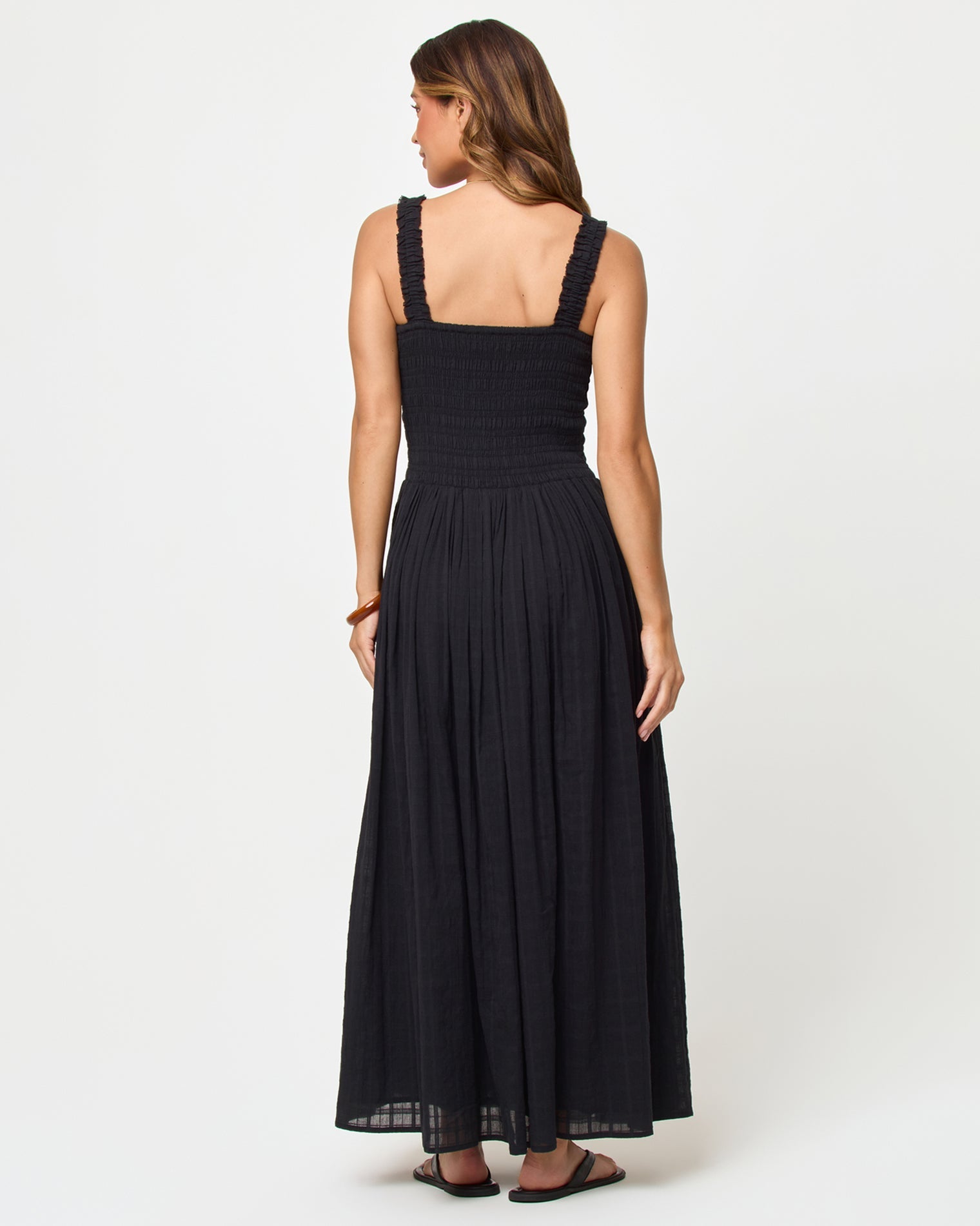 Robe longue noire en coton à smocks, larges bretelles et jupe ample