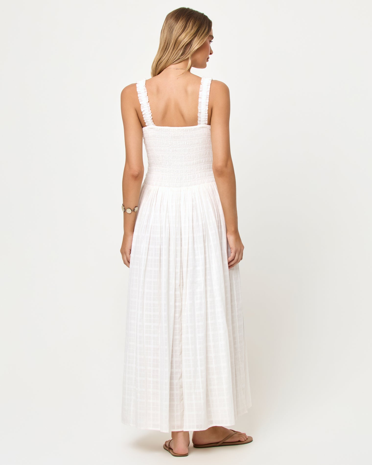 Robe longue en coton à jupe ample, bustier smocké et larges bretelles, coloris crème