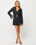 Jupe-short ajustée en lin noir avec short intégré et fermeture éclair latérale