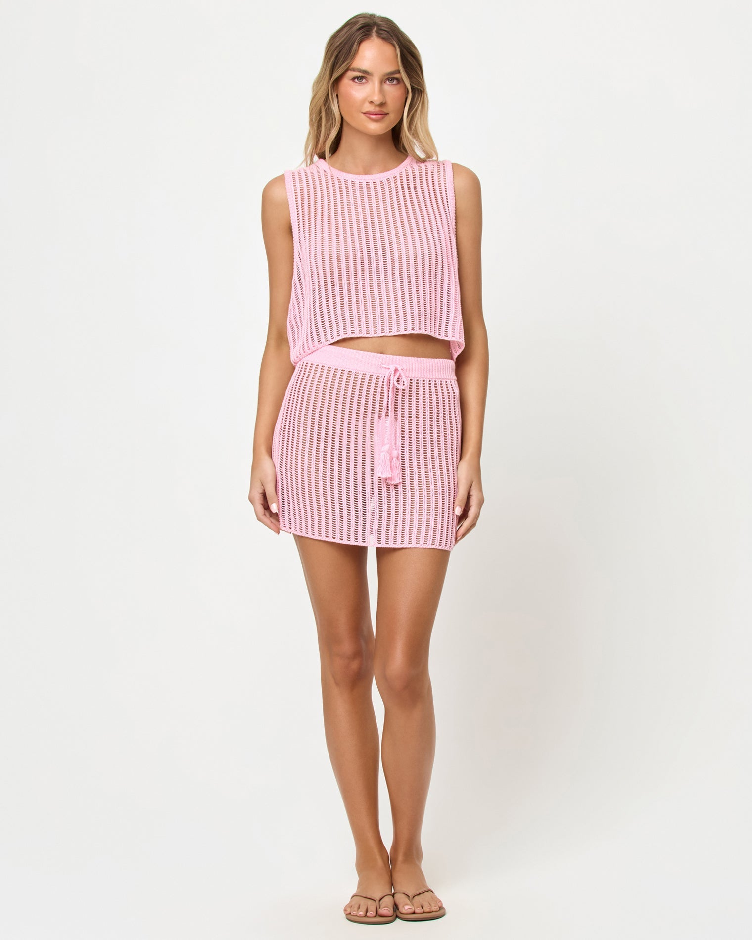 Haut court sans manches en crochet tricoté rose poudré