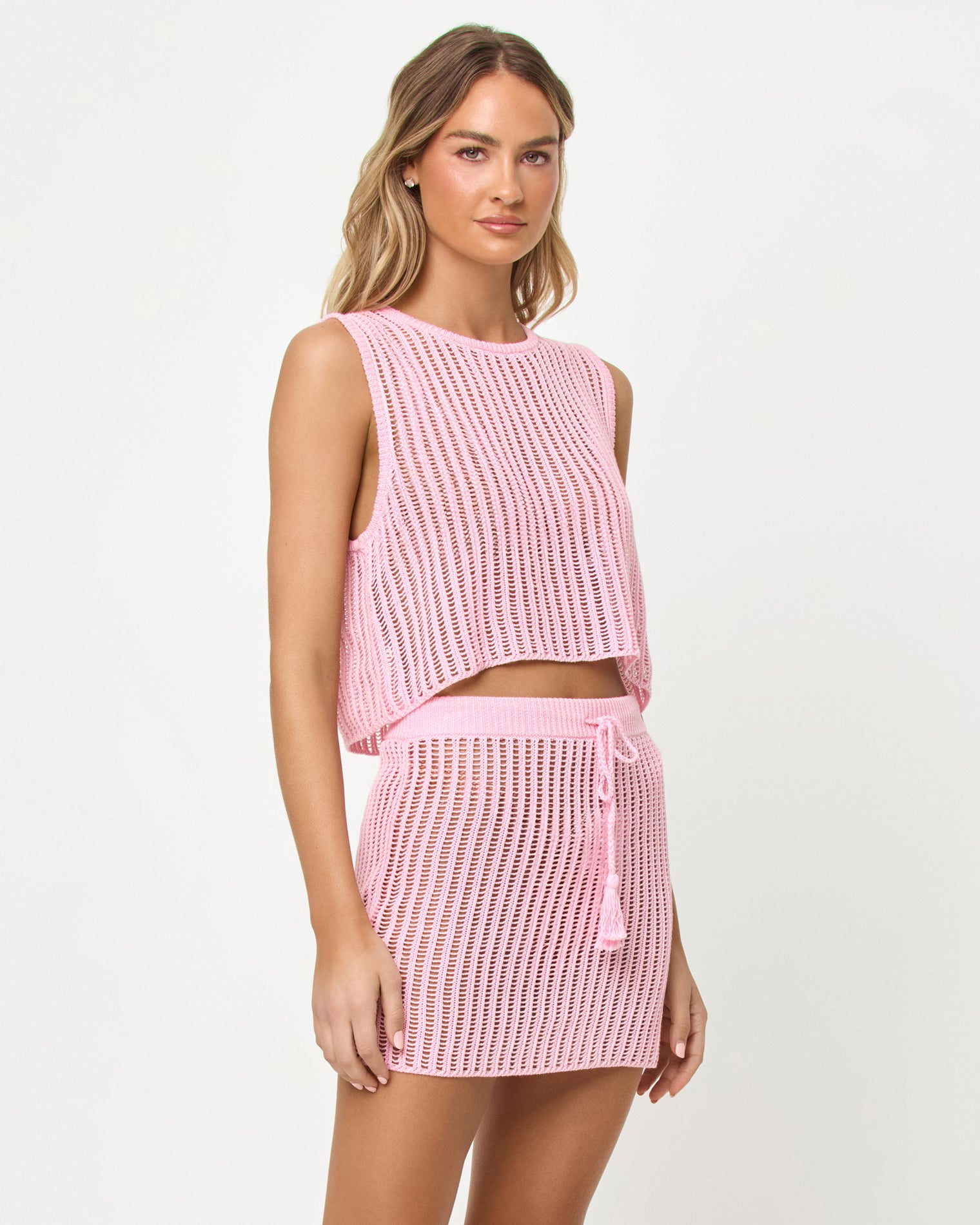 Haut court sans manches en crochet tricoté rose poudré